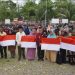 Pj Walikota Banda Aceh Bagikan Bendera sebagai Bagian Gerakan 10 Juta Merah Putih