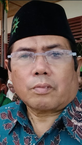 Drs. Talkisman Tanjung