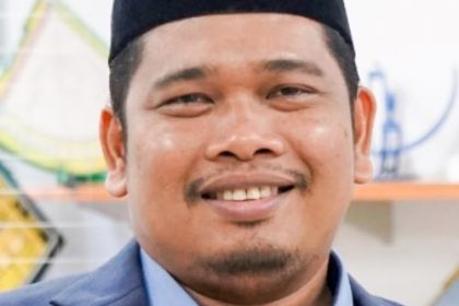 Dr. Arwin Juli Rakhmadi Butarbutar MA